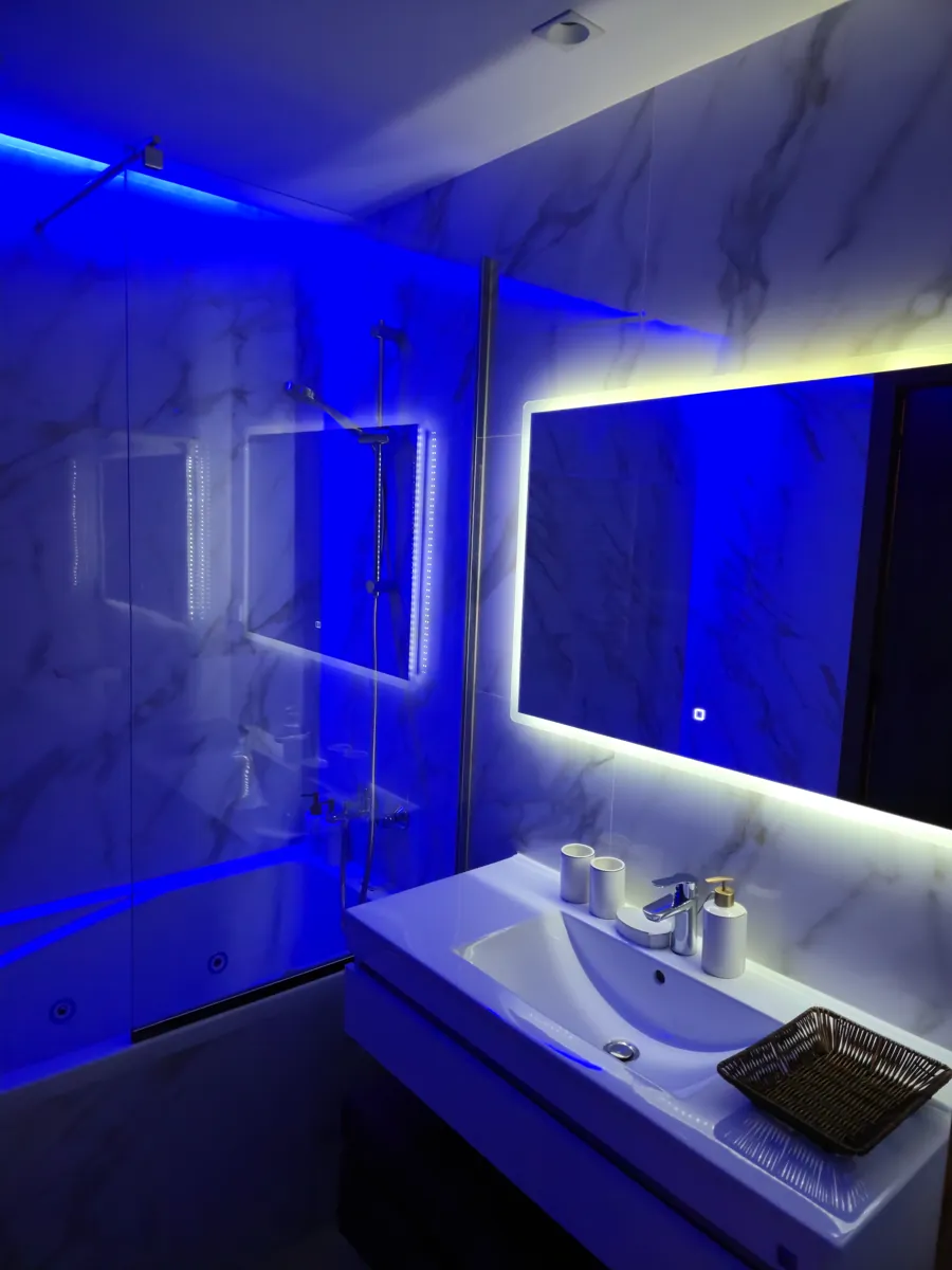 Bathroom with blue ambient LED lighting
