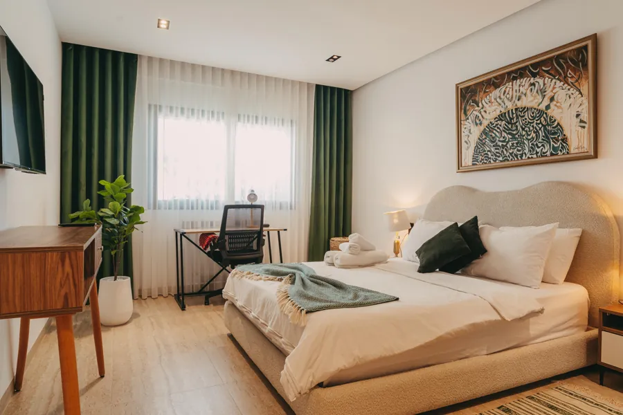 Bedroom with dedicated desk workspace