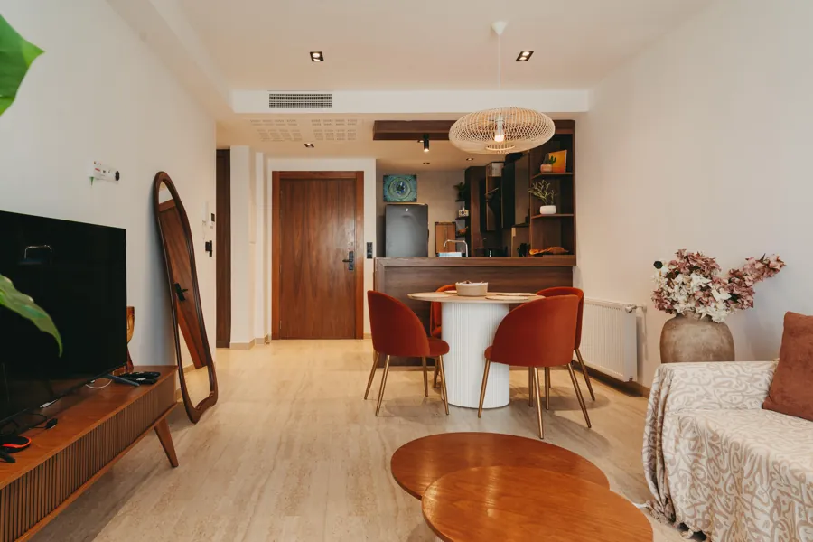 Open-plan view from the entry across dining and living areas