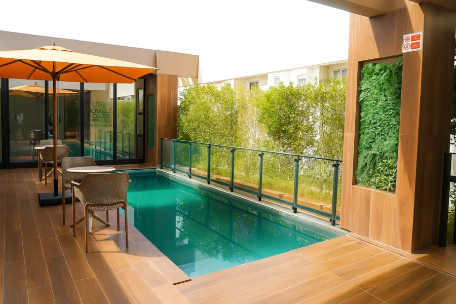 Rooftop pool with sun loungers